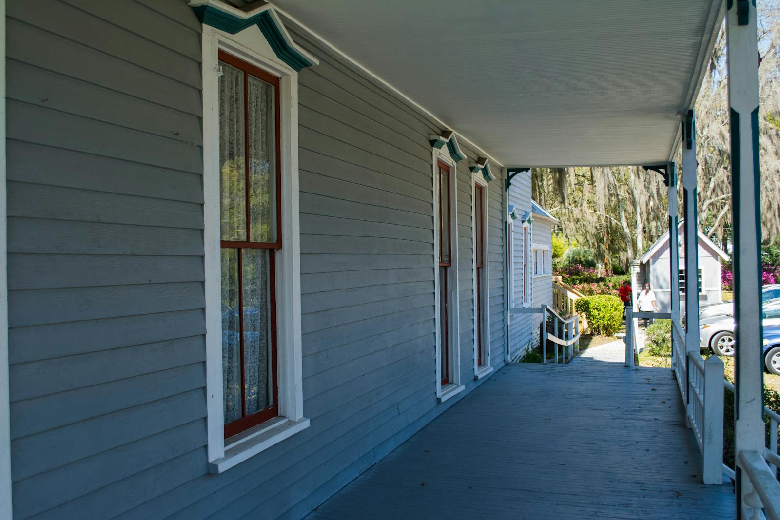 Covered porch and deck walkway at a completed residential project